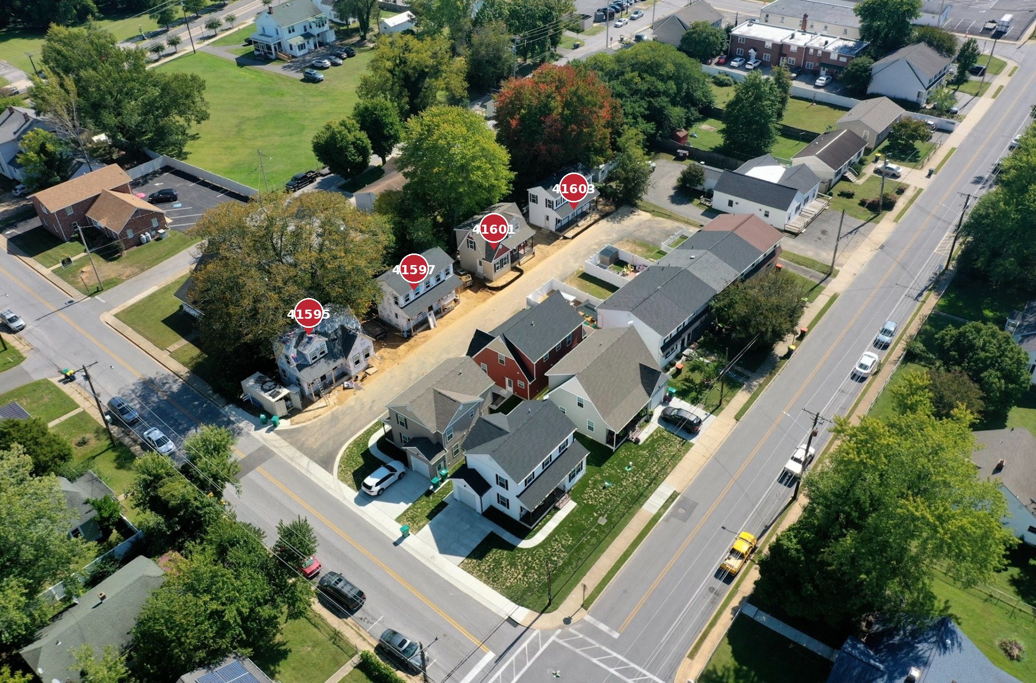 Aerial showing all eight Church Street cottages with red address pins for the four new homes: 41595, 41597, 41601 and 41603