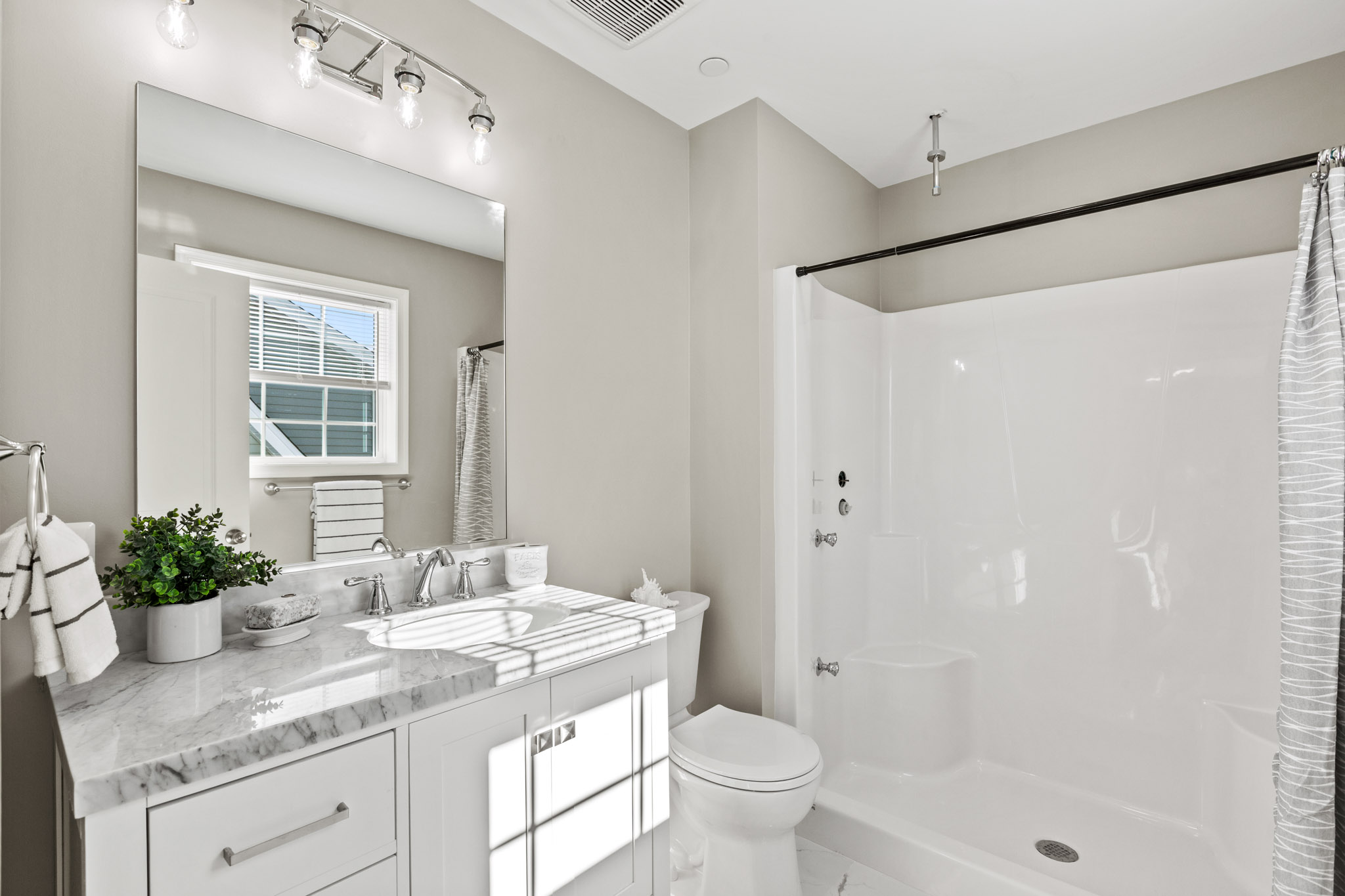 Bathroom in a completed Daisy model by the same builder