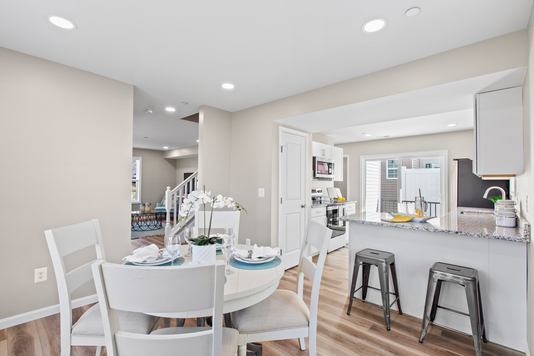 Dining and kitchen area in a completed Daisy model by the same builder